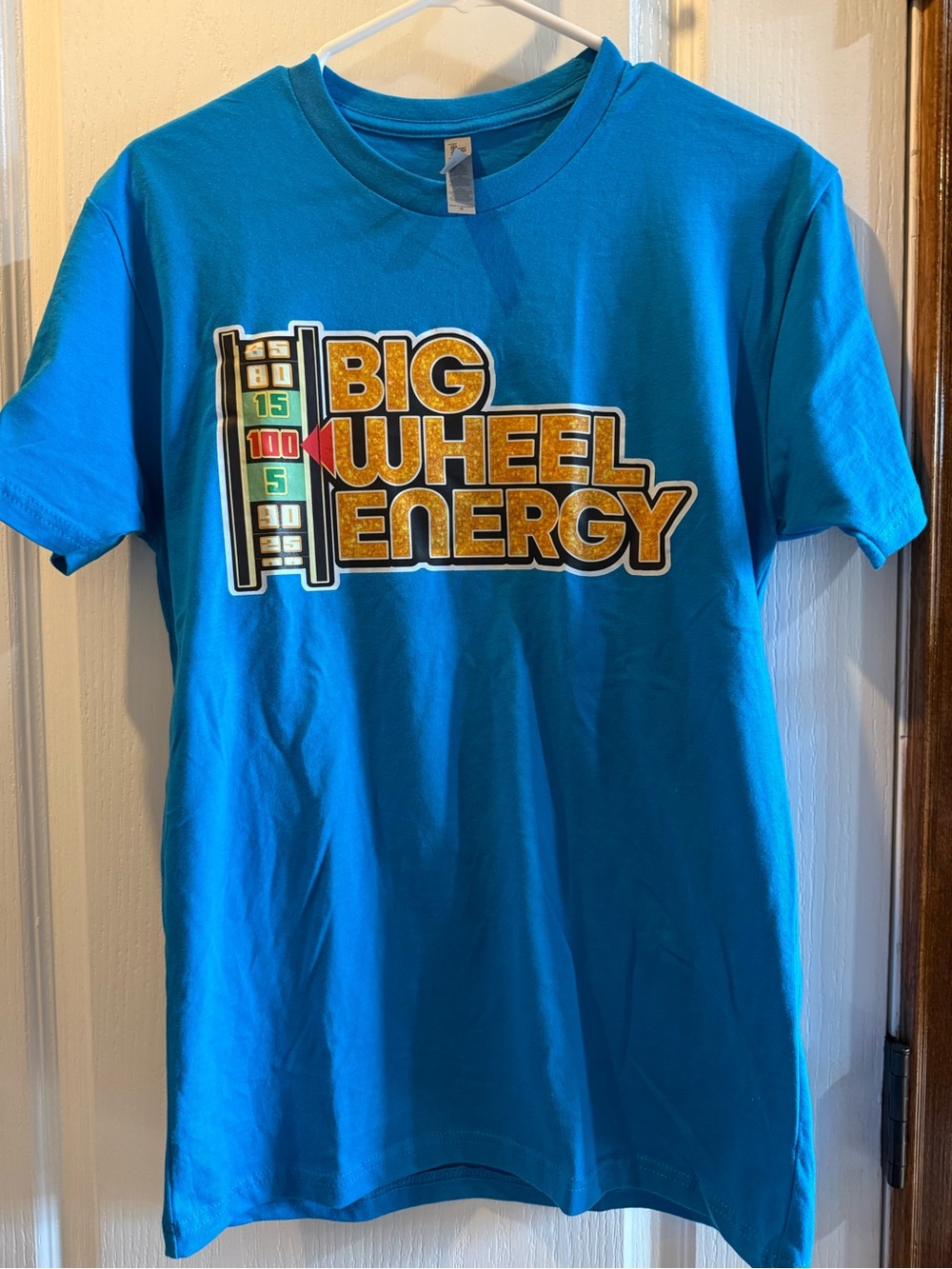 The Price is Right Teal "Big Wheel Energy" Graphic Tee
